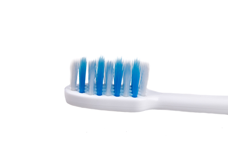 Closeup of small head toothbrush with soft and slim tapered bristle recommended by dentistの写真素材