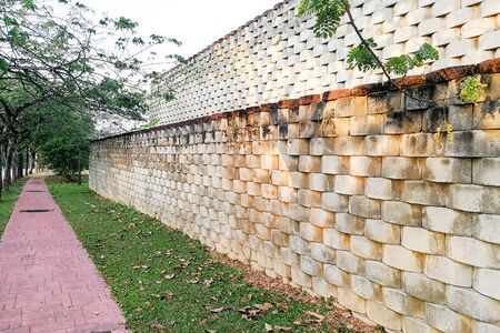 Interlocking designed retaining wall to manage earth erosion and  landscapingの写真素材