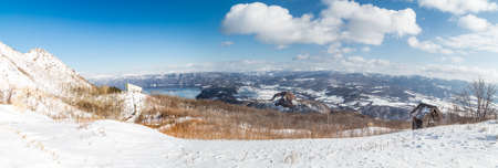 Panorama view of Showa Shinzan from Mount Usu or Usuzan and Lake Toya, in Hokkaido Japanの写真素材