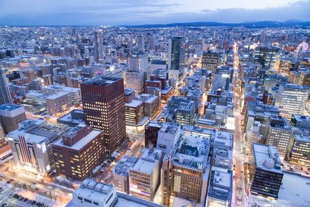 Sapporo, Japan, January 28, 2018: Dusk hour aerial view of central Sapporo city Hokkaido Japan during winterのeditorial素材