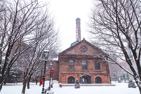 Sapporo, Japan, January 28, 2018:  Sapporo Beer Museum is popular tourist attraction.  Featured here is the main red brick building during winter with heavy snow.のeditorial素材