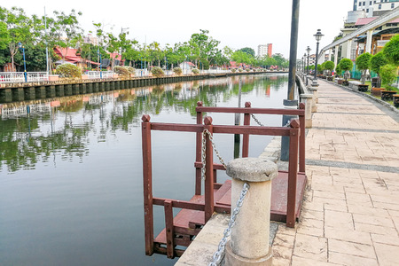 Malacca, Malaysia, April 8, 2018: Malacca city is awarded the UNESCO World Heritage City status with rich history. Featured here is Melaka River adjacent to Kampung Morten, village with old Malay houses.のeditorial素材