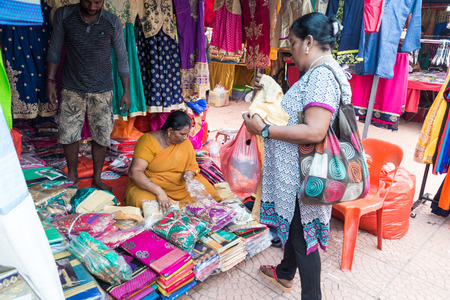 TELUK INTAN, MALAYSIA, May 1, 2018: Ethnic Malaysian Indian market stall selling Indian cultural theme merchandize to local and tourists at market stallsのeditorial素材