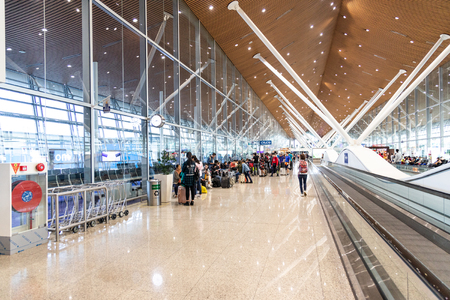 KUALA LUMPUR, FEBRUARY 9, 2019: Departure gates terminal at Kuala Lumpur International Airport KLIA are connected via the walkalator system.のeditorial素材