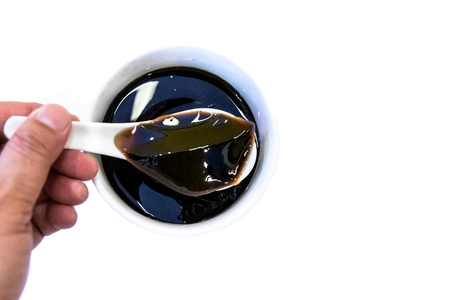 Spoon scoop guilinggao or turtle jelly is traditional Chinese herbal preparation for general healthcareの写真素材