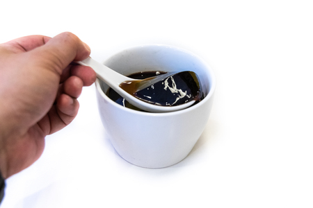 Spoon scoop guilinggao or turtle jelly is traditional Chinese herbal preparation for general healthcareの写真素材