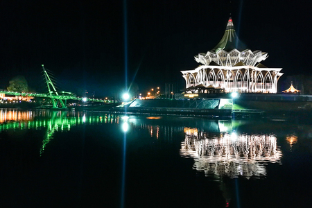 KUCHING, MALAYSIA, April 18, 2019: The Darul Hana bridge across Sarawak River overseeing the Sarawak State Assembly Building is popular tourist destination in Kuching.のeditorial素材