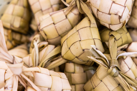 Heap of ketupat, rice dumpling popular Hari Raya festive delicacy in Malaysia and Indonesiaの写真素材
