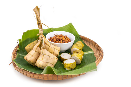 Ketupat, lemang, served with serunding, popular Malay delicacies during Hari Raya celebration in Malaysia