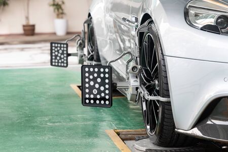 Car wheel clamp with wheel align device for wheel alignment in workshopの写真素材