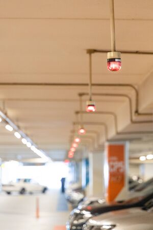 Smart car parking tracking system in mall with lights signals to track, indicated and navigate car to available vacancyの写真素材