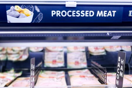 Processed Meat signage at the meat  section of supermarket with defocused backgroundの写真素材
