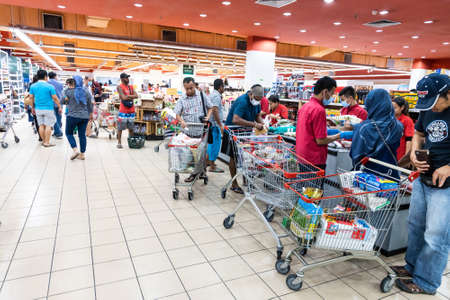 KUALA LUMPUR, MALAYSIA, MARCH 16, 2020: Panic buying among shoppers at supermarkets resulting empty shelves, with rumour of potential lock down amid covid-19 pandemic threat.のeditorial素材