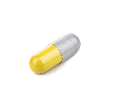 Close-up of medicine drug in capsule format on white background