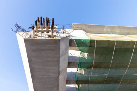 Close-up of concerete beam joints metal bar in highway overlay bridge construction