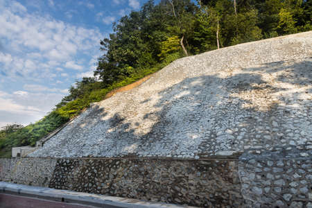 Slope retention engineering to prevent soil erosion and landslide in tropical highlandの写真素材