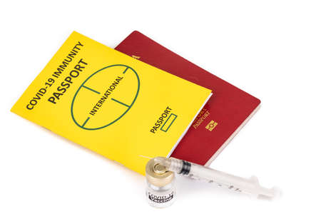 Concept of Covid-19 Immunity Passport for travel with vial and syringeの写真素材