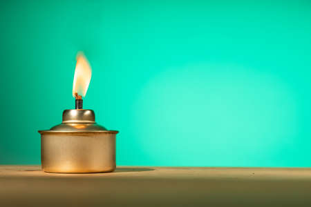 Pelita or oil lamp, traditional Malay oil lamp lit up during Ramadan and Hari Raya Aidilfitri Muslim...