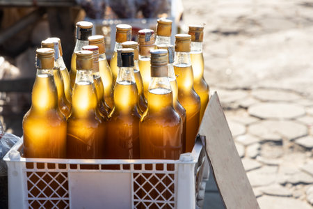 Locally cultivated pure honey sold in stalls by local Thai people along Mae Hong Son and Pai road route in Northern Thailandの写真素材