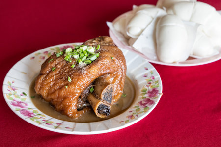 Braised pork leg served with mantou, popular Yunnan food served in Ban Rak Thai, Mae Hong Son province in Thailandの写真素材
