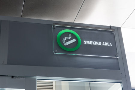 Signage of Smoking Area on smoking room or lounge at airport departure terminalの写真素材