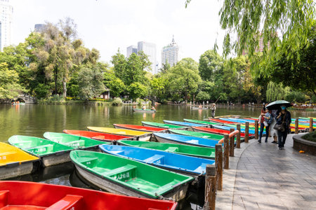 Visitors strolling in Chengdu Renmin Park or Peoples Park. It is comprehensive park which combines...