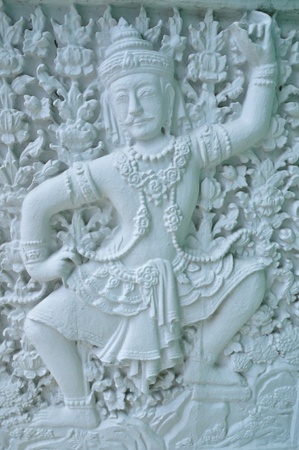 Thai art on the white wall of Thai templeの写真素材