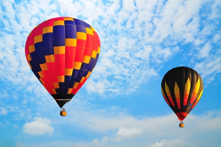 hot air balloon with beautiful blue sky and nice cloud in Thailand.の写真素材