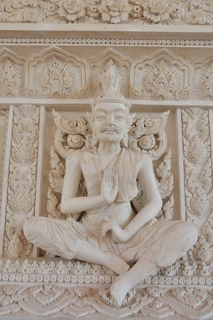 Ascetic statue in Thai style molding art の写真素材