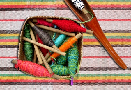 spool of thread and shuttle of thai cloth weaving machineの写真素材
