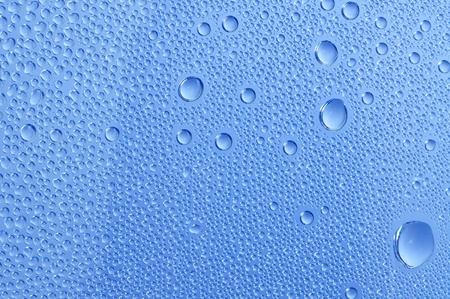 water drop on transparent blue backgroundの写真素材