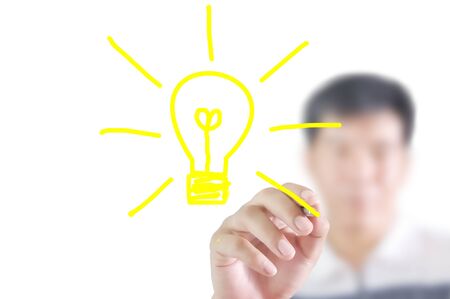 Man write light bulbの写真素材