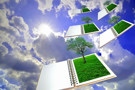 open book with tree flying to the sun の写真素材