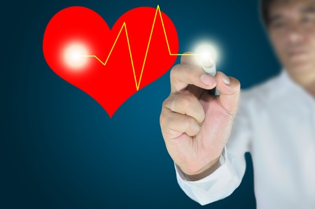 business man write or draw heart and heart pulseの写真素材