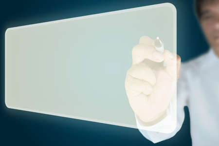 Hand of business man write a blank flying button の写真素材