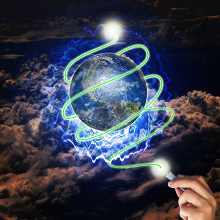 Male hand draw earth globe with tree on abstract background as conceptual image.の写真素材