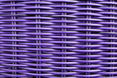Simulated plastic rattan weaving or artificial texture (furniture). Color is purple の写真素材