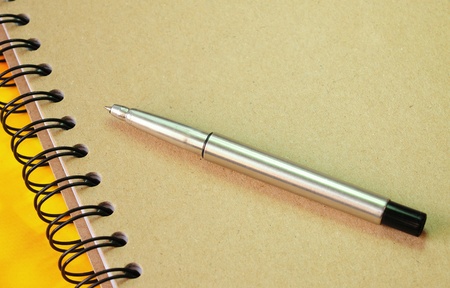 Ring binder book and ball penの写真素材