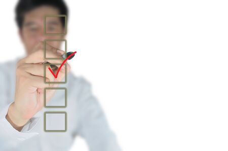 Hand of business man write a choice の写真素材