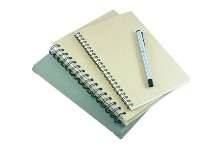 Stack of recycled paper notebook and velvet cover Book with ball pen.  Clipping path included.の写真素材