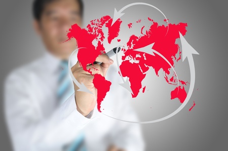 Business man write global network or globalization concept on touch screen の写真素材