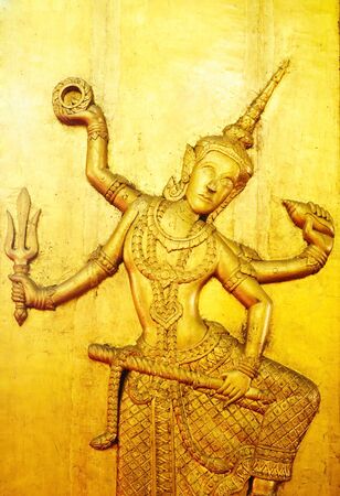 Ancient northern thai art of wood carving on wooden doorのeditorial素材