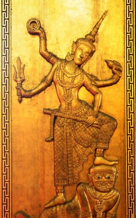 Ancient northern thai art of wood carving on wooden doorのeditorial素材