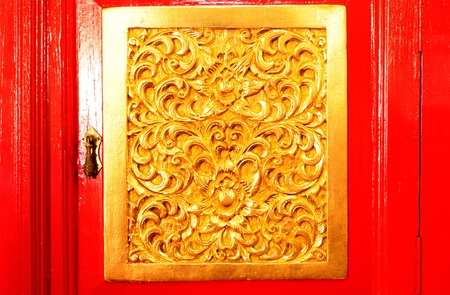 Ancient northern thai art of wood carving on wooden box.の写真素材