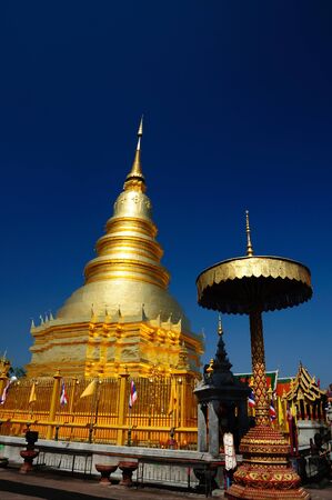 Golden Pagoda at Wat Phra That Haripoonchai temple, Lampoon, North of Thailand.の写真素材