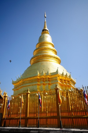 Golden Pagoda at Wat Phra That Haripoonchai temple, Lampoon, North of Thailand.の写真素材