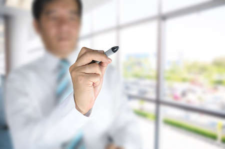 businessman on office backgroundの写真素材