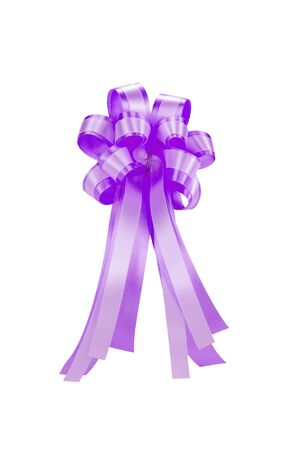 purple ribbon bow isolated on white, clipping path includedの写真素材