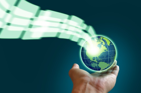 Male hand holding a glowing earth globe in globalization concept