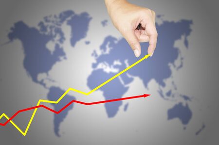 Male hand and business graph growingの写真素材